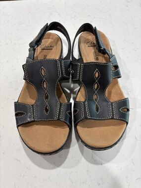 Clarks Black Leather Slingback Sandals with Tan Footbed